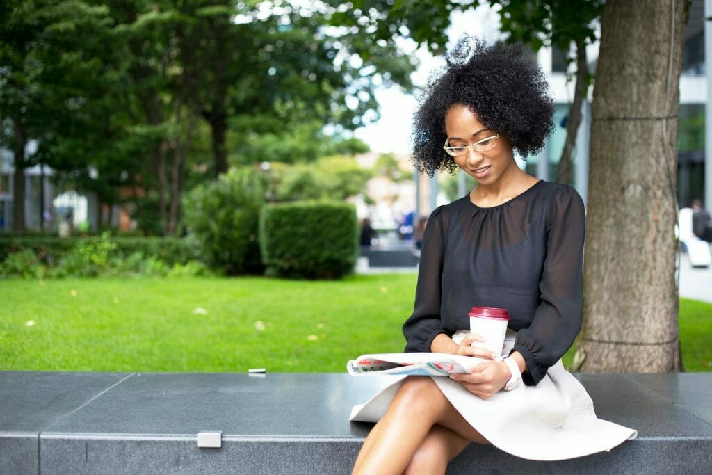woman reading magazine