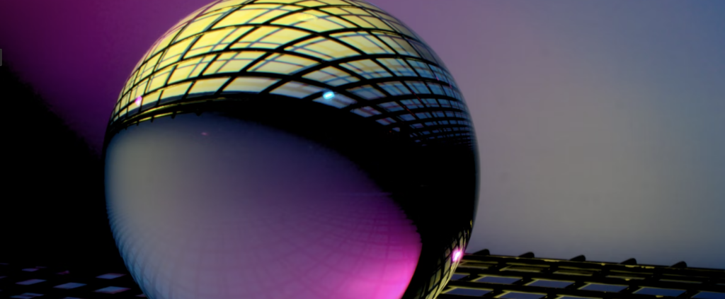 an image of a marble on a cage with the reflection of the cage on the marble